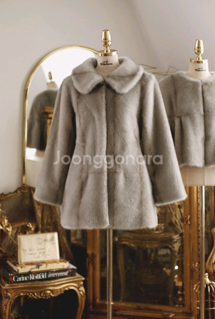 (새상품 택있음)밀크코코아 제작 퍼 코트--2