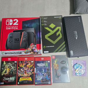 닌텐도 스위치2 본체 + 게임3개 + 그립케이스 + 좀비액보 판매합니다
