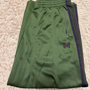 니들스HD 트랙팬츠