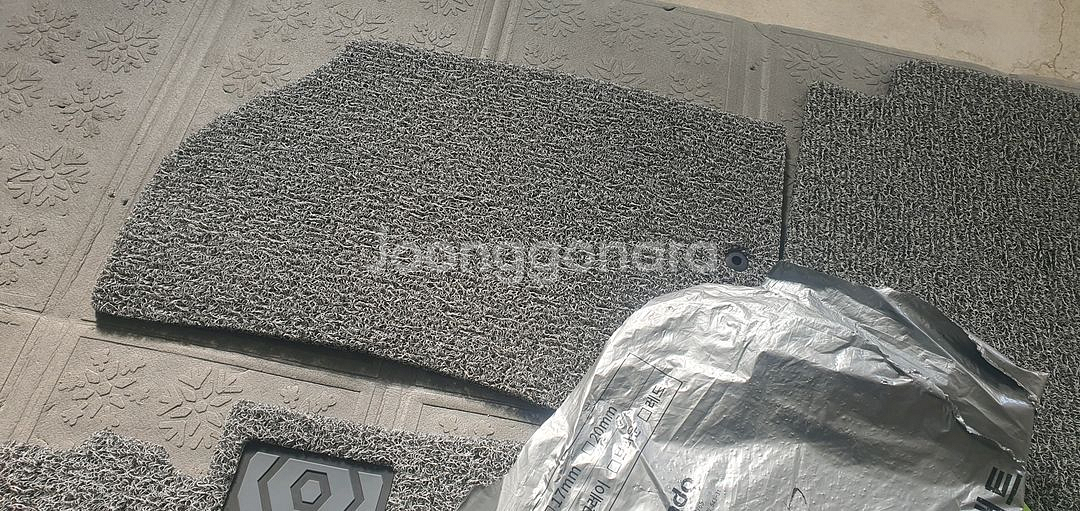 그랜저GN7 코일매트입니다. 만도 제품이고, 친환경 프리미엄 코일매트라고 적혀있네요.--2