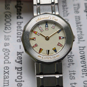 코럼(CORUM) 어드미럴스 컵 만국기 요구르트판 여성