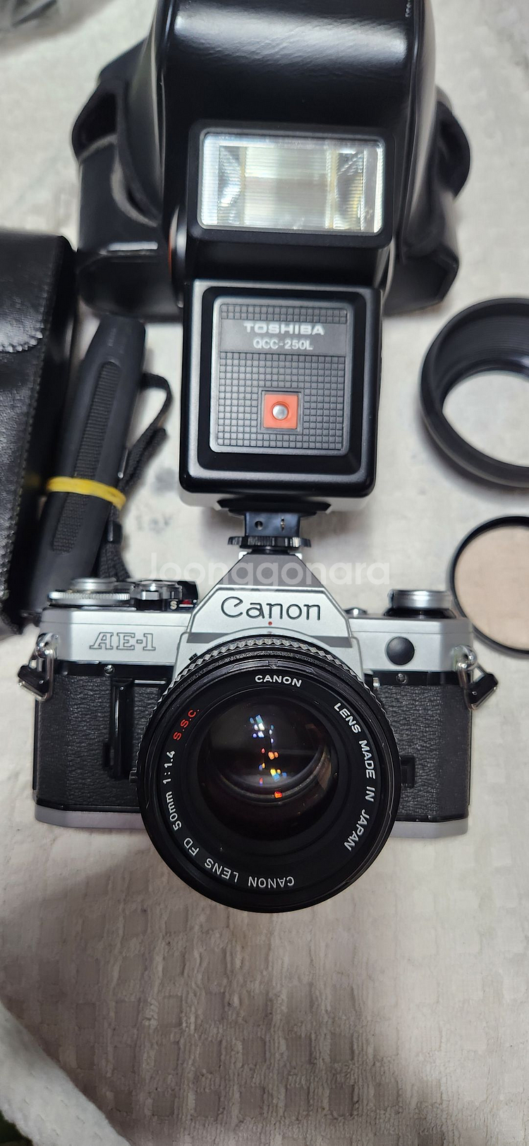 캐논AE-1(A급), 캐논렌즈 50/1:1.4 S.S.C, 후레쉬, 케이스.--0