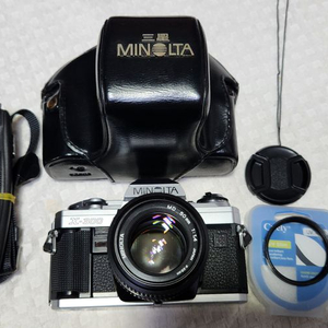 미놀타 X-300(a급), lr44 2개 기능ok, 미놀타렌즈50/1:1.4(깨끗함), 케이스.