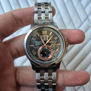 세이코 프리미어 snp054 j 로즈골드 키네틱 무브 퍼페츄얼캘린더 시계