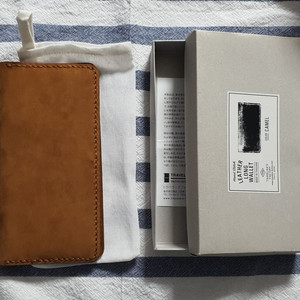 TF 트래블러스팩토리 가죽 지갑 롱 카멜