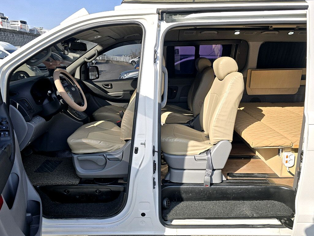 14년형 스타렉스4인승일체형루프탑캠핑카--9