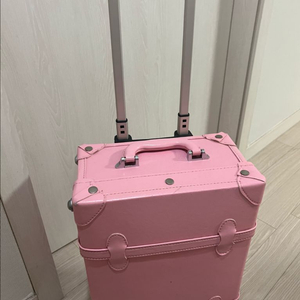 핑크 캐리어 가방 이미지