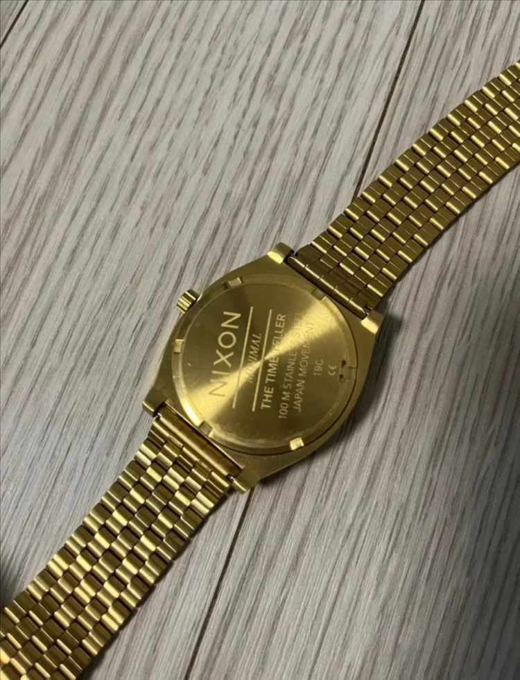 NIXON 닉슨 타임텔러 골드/블랙 시계 이미지