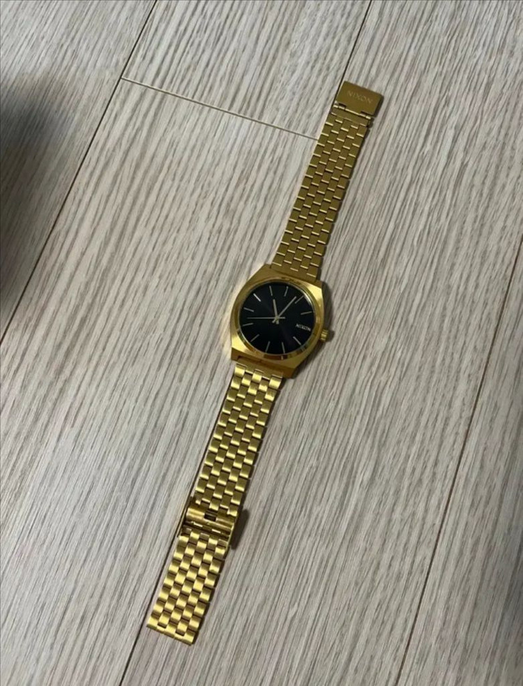 NIXON 닉슨 타임텔러 골드/블랙 시계 이미지