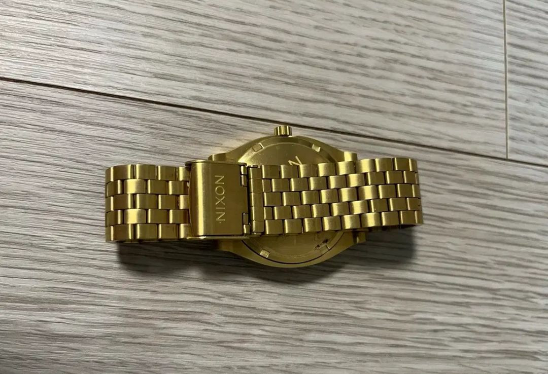 NIXON 닉슨 타임텔러 골드/블랙 시계 이미지