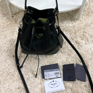 프라다 버킷백 사피아노 레더크로스백숄더백테수토호보백아바백구찌루이비통디올셀린느샤넬생로랑에르메스