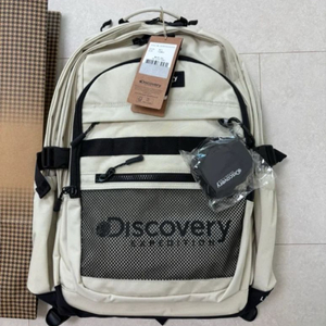 디스커버리 아이보리 백팩