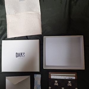 닥스 브라운 패턴 소가죽 카드지갑 DCHO4F792