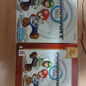 wii 마리오카트 미개봉핸들2개+cd 팝니다 이미지