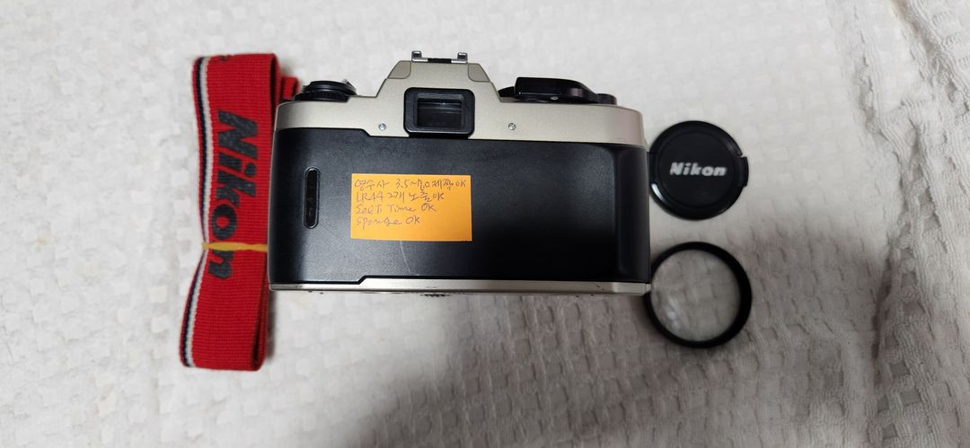 니콘fe10(a급), lr44 2개 기능노출정상 니콘렌즈35~70, 스트랩. 이미지