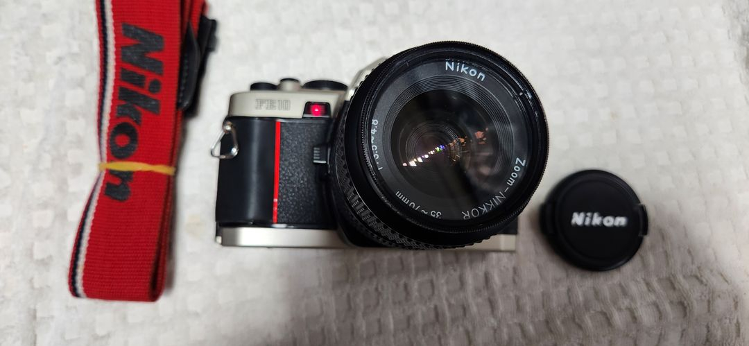 니콘fe10(a급), lr44 2개 기능노출정상 니콘렌즈35~70, 스트랩. 이미지