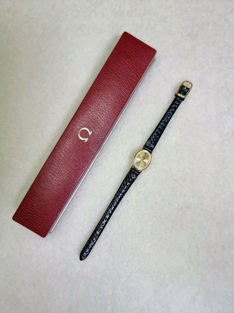 오메가 드빌 빈티지 오벌 샴페인 선레이 다이얼 쿼츠 여성시계--4