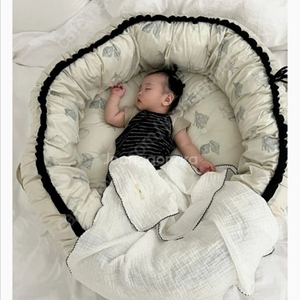 mer 아기침대 baby nest 이미지