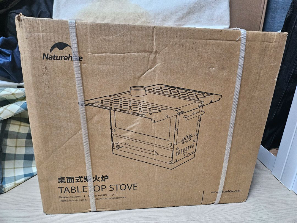 네이처하이크 테이블탑 화목난로 미개봉 팝니다. 이미지