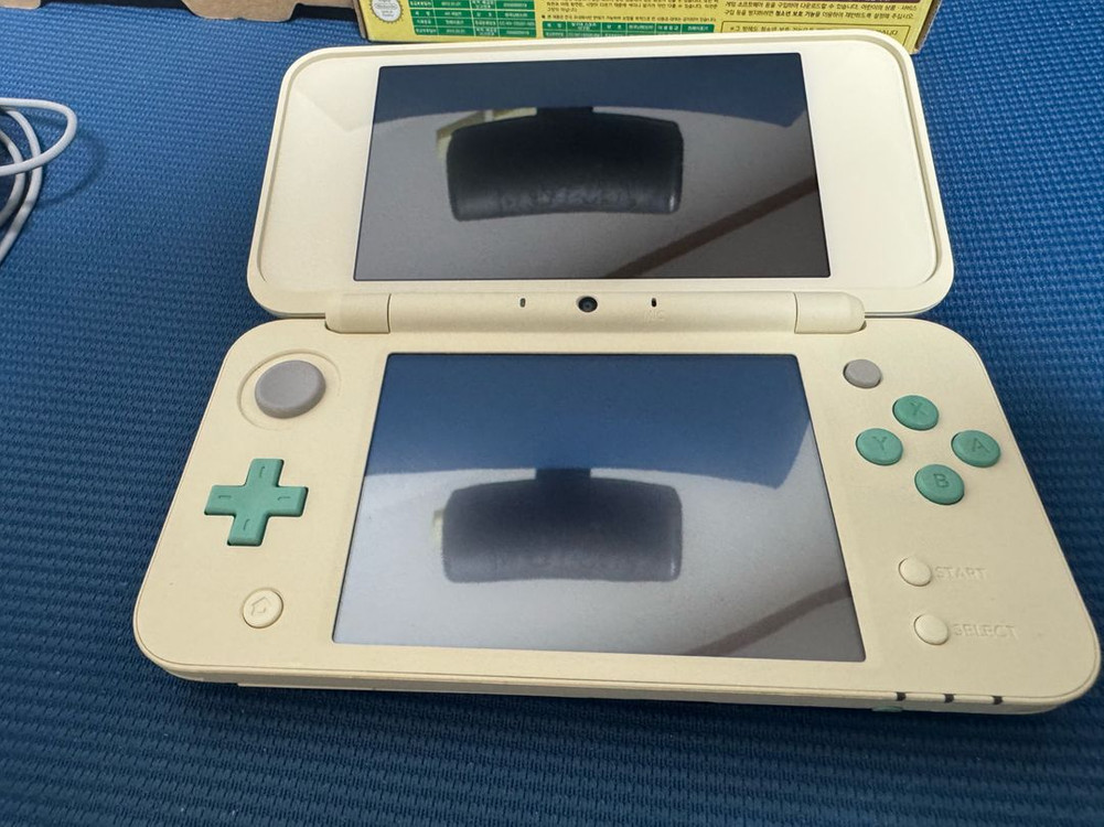 닌텐도 뉴 2ds xl 튀어나와요 동물의숲 에디션 이미지