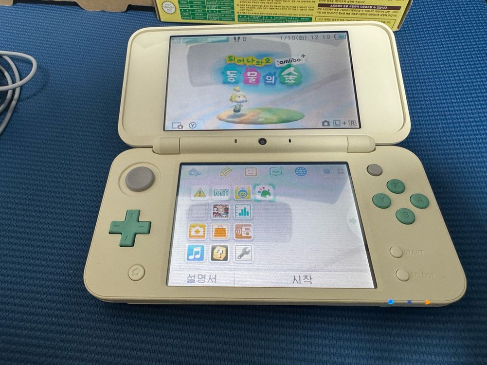 닌텐도 뉴 2ds xl 튀어나와요 동물의숲 에디션 이미지