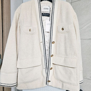 O2nd의 크림색 패딩안감 가디건