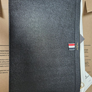 톰브라운 가죽 클러치백