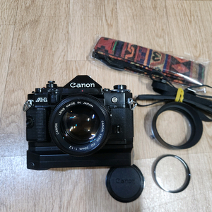 캐논 A-1바디및 50mm F1.2 렌즈 + 모터드라이브 셋트 판매합니다