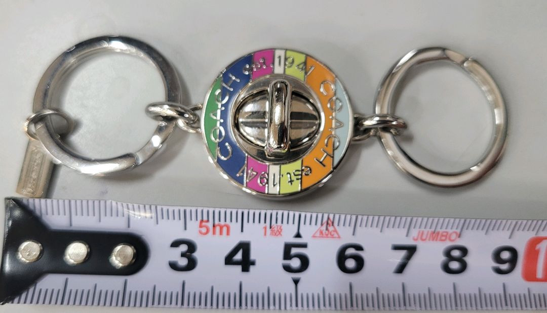 코치 키홀더 턴록 레거시 스트라이프 이미지