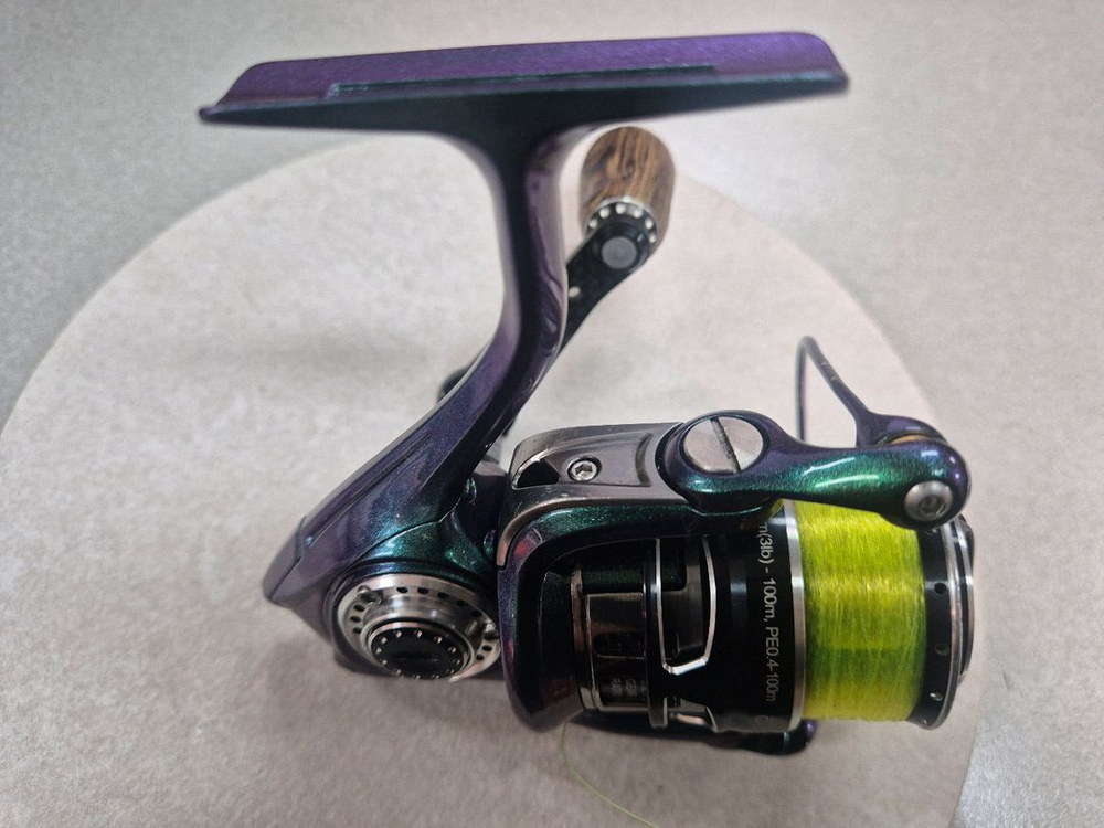 아부 레보mgx1000S 커스텀 색상(카멜레온) 스피닝릴--1