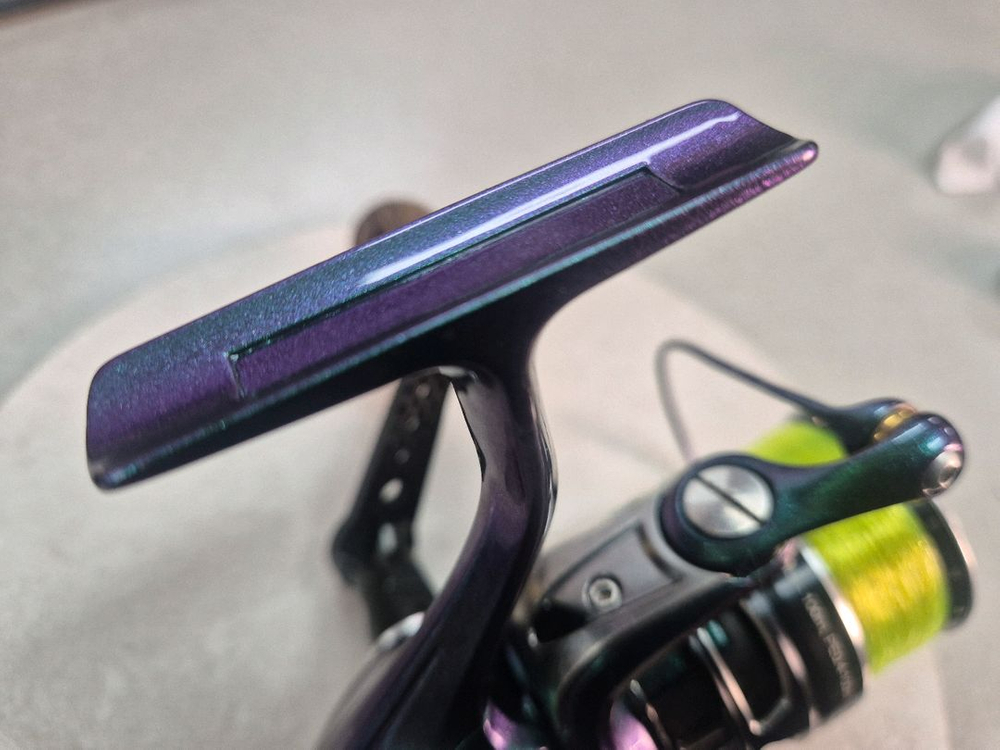 아부 레보mgx1000S 커스텀 색상(카멜레온) 스피닝릴--3