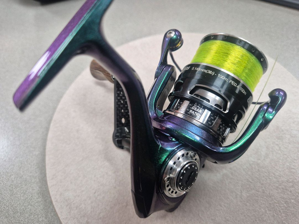 아부 레보mgx1000S 커스텀 색상(카멜레온) 스피닝릴--6