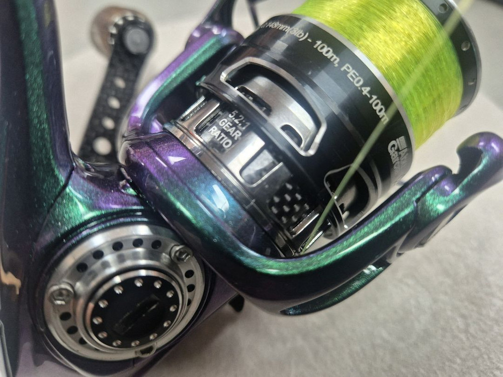 아부 레보mgx1000S 커스텀 색상(카멜레온) 스피닝릴--7