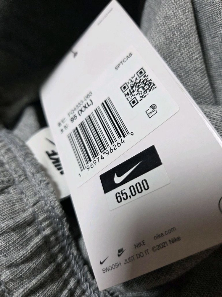 나이키 스포츠웨어 클럽 남성 니트 오픈 헴 팬츠 FQ4333-063, FQ4333-010 블랙 그레이 Nike 이미지