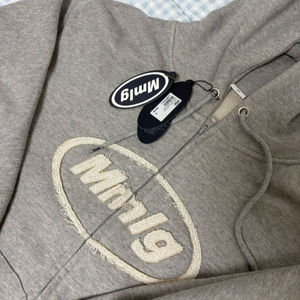 Mmlg 후드집업 이미지