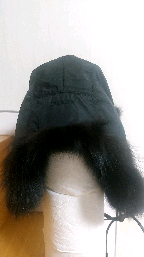 프라다 PRADA 정품 블랙 폭스퍼 트래퍼 햇 (1HC137) 이미지