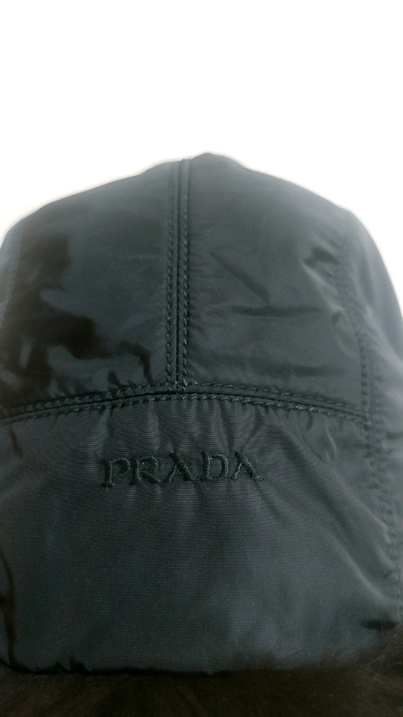 프라다 PRADA 정품 블랙 폭스퍼 트래퍼 햇 (1HC137) 이미지