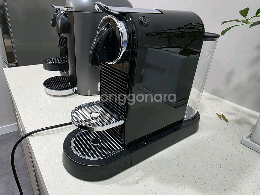 네스프레소 시티즈 캡슐 커피머신 D113 블랙 판매--1
