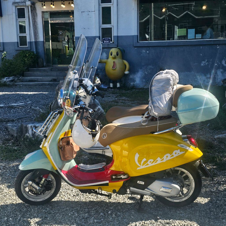 베스파 프리마베라 션 우더스푼 400만 이미지