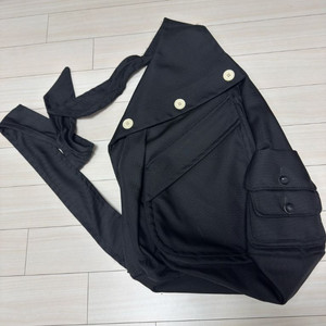 이스트팩 x 라프시몬스 슬링백 블랙 단추o 이미지