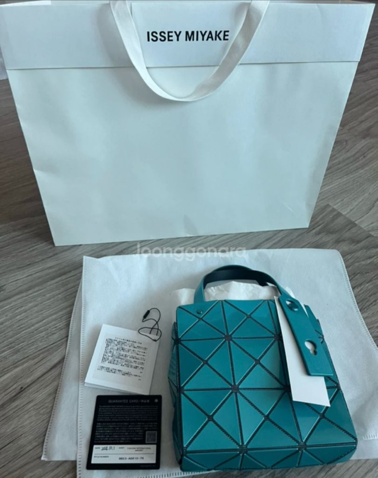 바오바오 캐럿 미니 토트백 터콰이즈 색상 9월 한정판 이미지