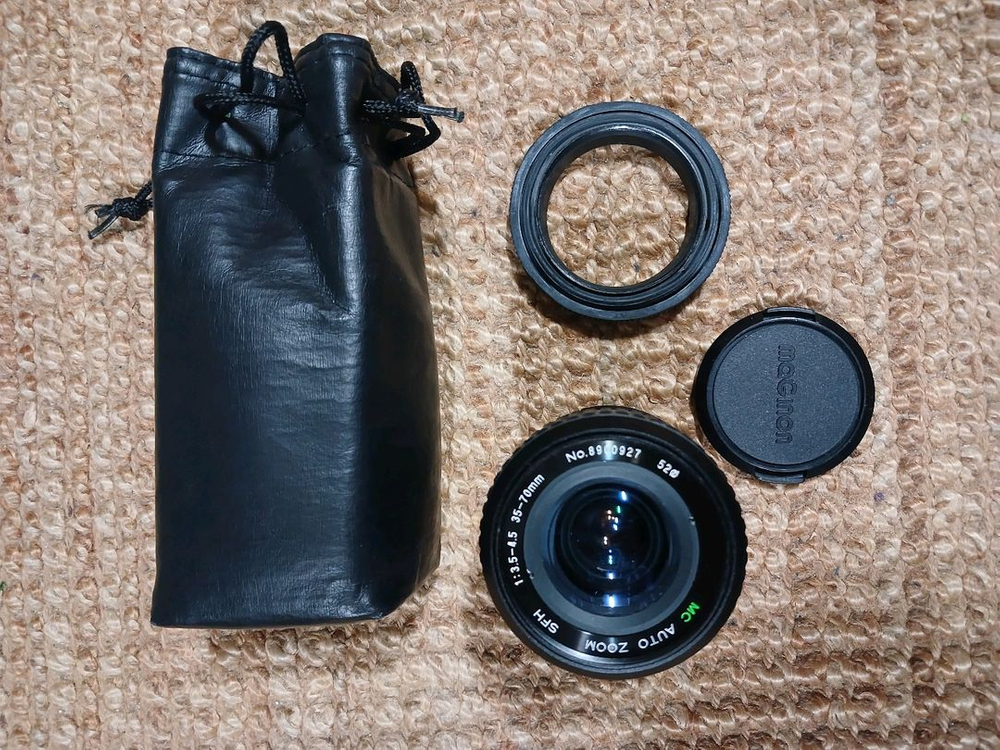 미놀타 X-700 카메라에 삼성 렌즈까지 드리는 세트 상품입니다. 카메라 보관에 용이한 가죽 케이스--3