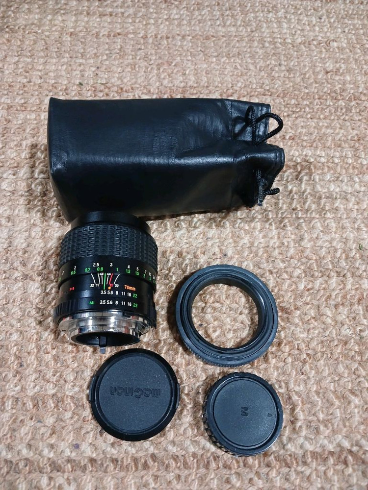 미놀타 X-700 카메라에 삼성 렌즈까지 드리는 세트 상품입니다. 카메라 보관에 용이한 가죽 케이스--5