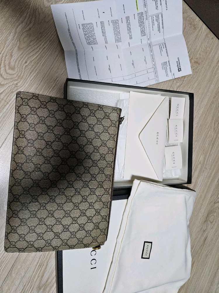 구찌 GG 수프림 클러치백--1