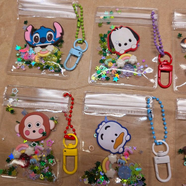 행운 지퍼백 캐릭터 키링 6개. 스티치 티거 구피 포챠코 몽키치 페클 이미지