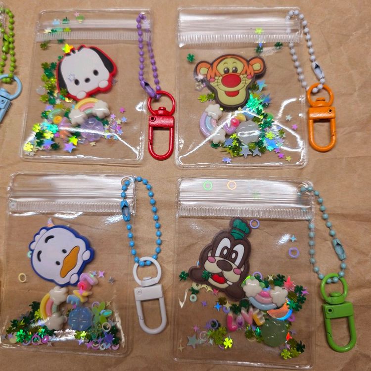 행운 지퍼백 캐릭터 키링 6개. 스티치 티거 구피 포챠코 몽키치 페클 이미지