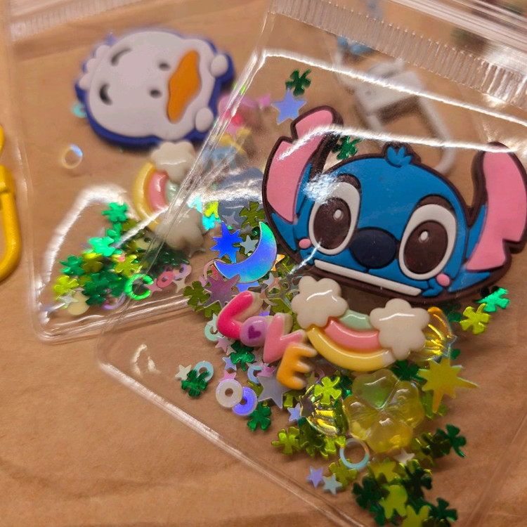 행운 지퍼백 캐릭터 키링 6개. 스티치 티거 구피 포챠코 몽키치 페클 이미지