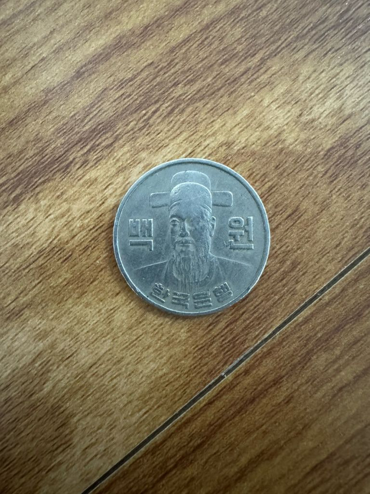 1975년 100원 동전 이미지