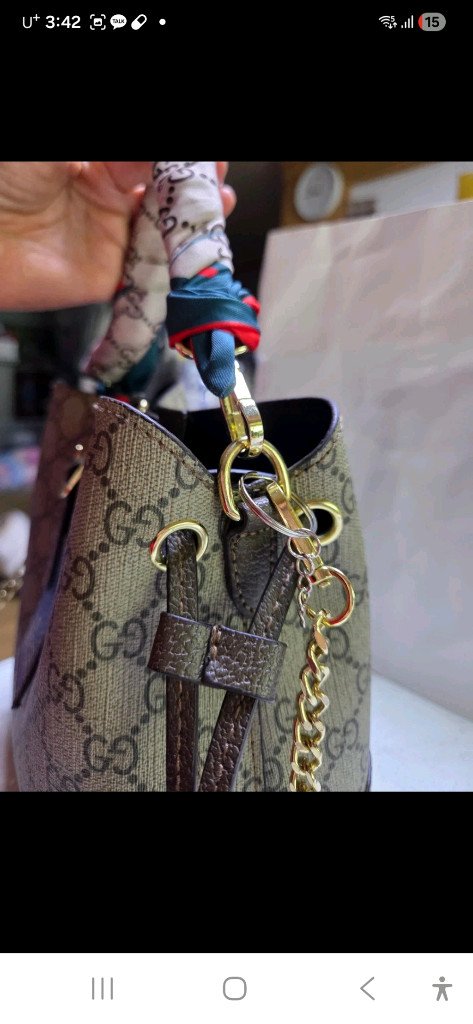 구찌 GG 로고 미니 버킷백 브라운(중고) 이미지