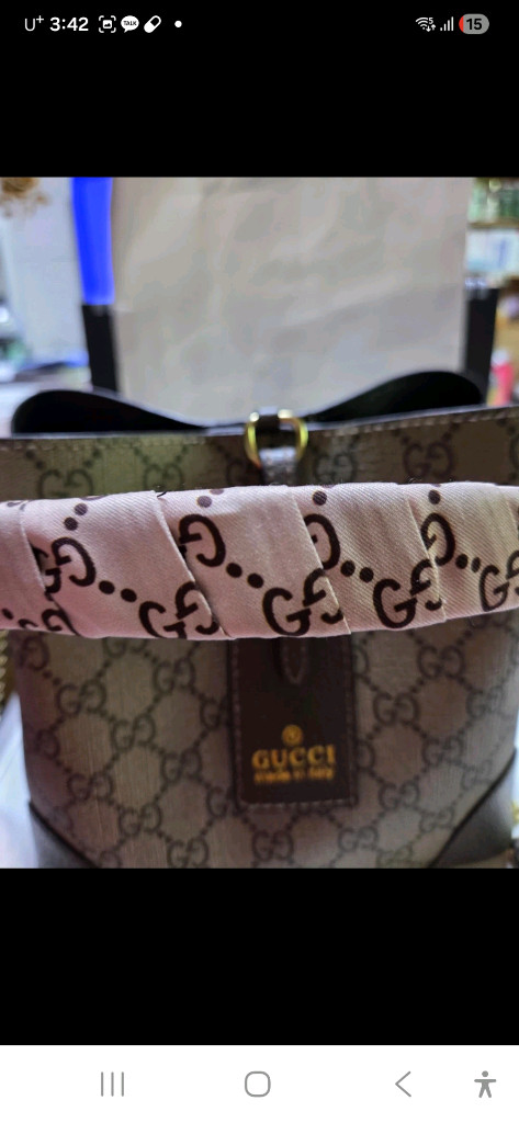 구찌 GG 로고 미니 버킷백 브라운(중고) 이미지